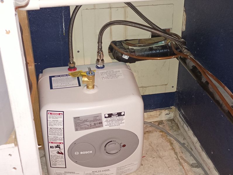 Plumbing Access with On Demand Water Heater
